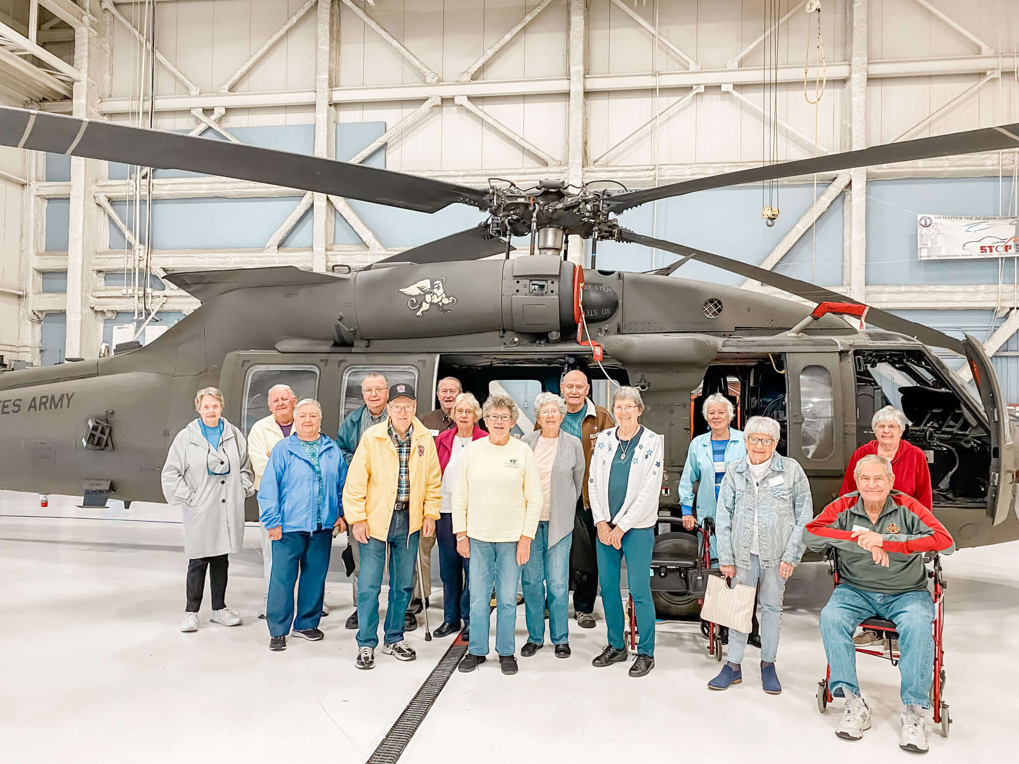 seniors looking at a helicopter