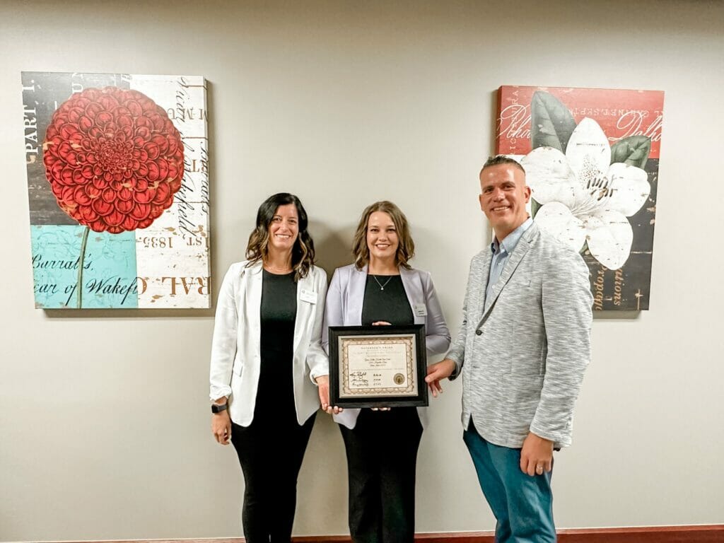 From L-R; Green Hills Director of Clinical Services; Katie Seydel, Green Hills Administrator; Jessica Walker, Director of the Iowa Department of Inspections and Appeals; Larry Johnson Jr.   