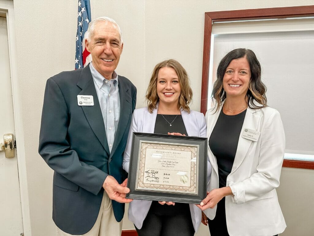From L-R; Green Hills Health Care Center Board President, Clarence Cory, Administrator; Jessica Walker, Green Hills Director of Clinical Services; Katie Seydel