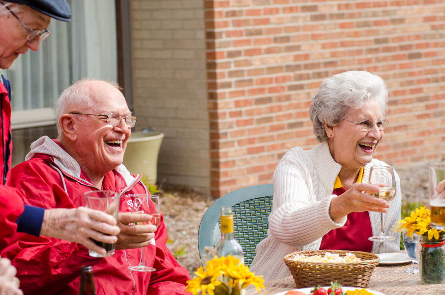 Yoders-Cheers seniors cheersing wine glasses