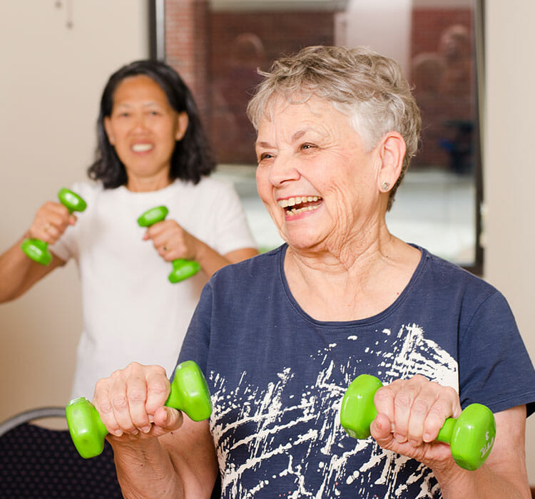 senior women doing rehab exercises